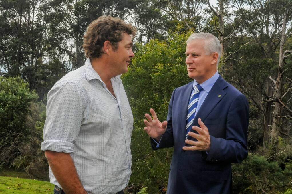 DELIVERED: Scottsdale farm owner Cameron Moore speaks with Deputy Prime Minister Michael McCormack at the funding announcement. Picture: Neil Richardson