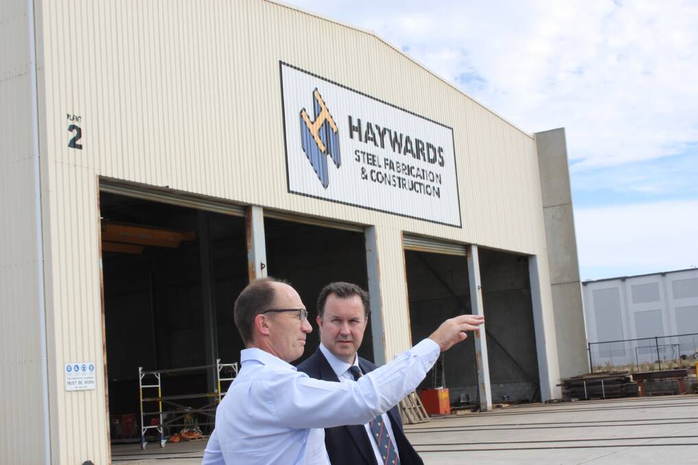 GRANT: Crisp Bros. & Haywards managing director Steve Edmunds and Tasmanian senator David Bushby. Picture: Supplied