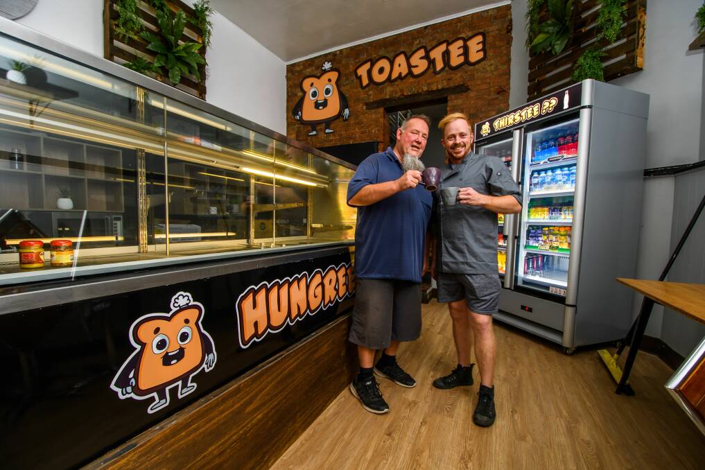 TOASTEE: Former Townsend's Bakery co-owner Leigh Townsend and Toastee owner Nick Kaine toast the opening of a new business. Picture: Scott Gelston