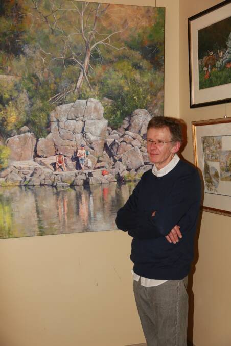 WINNER: Brad Quinn next to the Tas Art Award winning Cataract Gorge 2. The Eskleigh Foundation acquired the painting for its permanent collection. Picture: Supplied