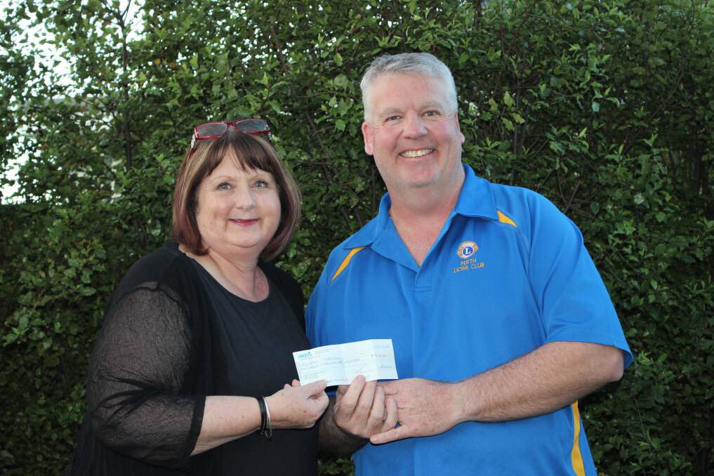 DONATION: Cystic Fibrosis Tasmania president Judi McGee received the $4000 cheque from Perth Lions Club Brian Mathieson. Picture: Supplied