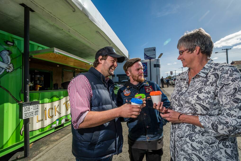 BEAN: Fick the Bean co-owner Edward Crick, employee Gerard Rush and Epilepsy Tasmania chief executive Wendy Groot out the coffee store's High Street location. Picture: Phillip Biggs