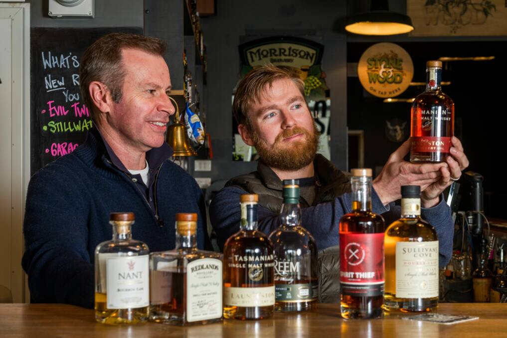 NICE SPREAD: Launceston Distillery head distiller and director Chris Condon and Saint John Craft Beer barman Jesse Campling. Picture: Phillip Biggs