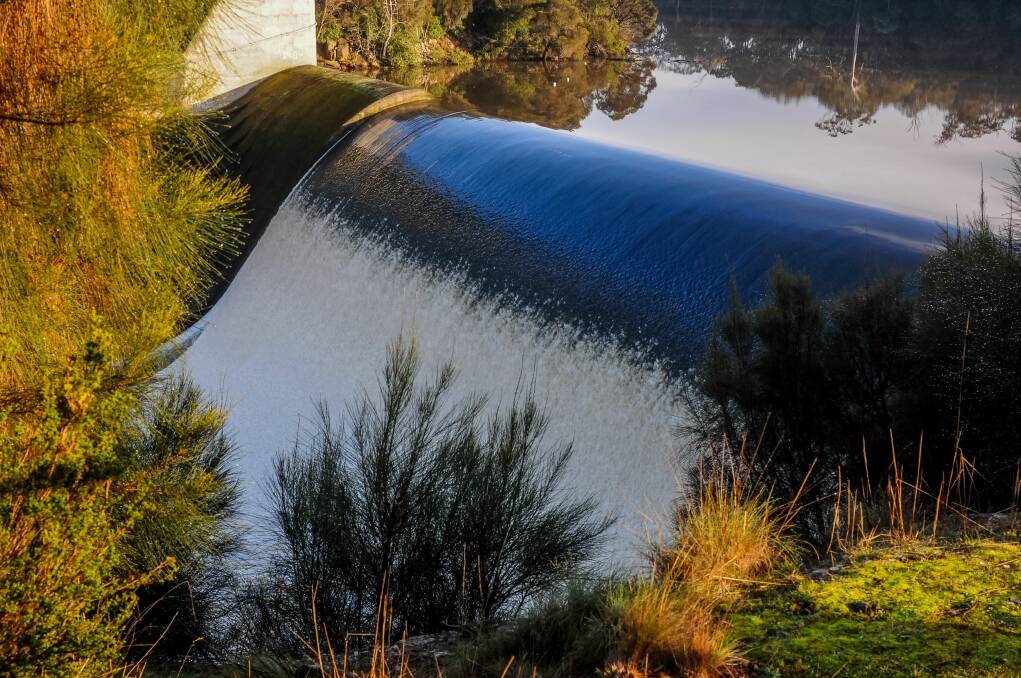 OVERFLOW: Trevallyn Dam is one metre over its spillway after a rainy July, according to Hydro Tasmania. It is one of a number of dams overflowing. Picture: Neil Richardson