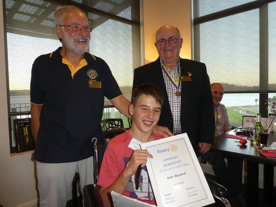 AWARD: West Tamar Rotary member James Tyson, new honorary member Nick Maynard and West Tamar Rotary member Lewis Davies at the ceremony. Picture: Supplied