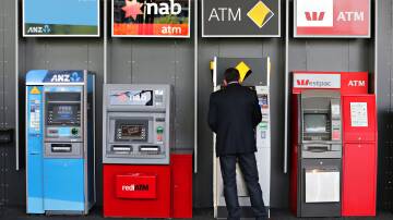 MELBOURNE, AUSTRALIA - SEPTEMBER 22: Generic 'Big Four Banks' - ANZ Bank, Commonwealth Bank, NAB Bank and Commonwealth Bank. General view of people walking past bank atms on 22 September, 2015 in Melbourne, Australia. (Photo by Paul Rovere/Fairfax Media) Generic banks