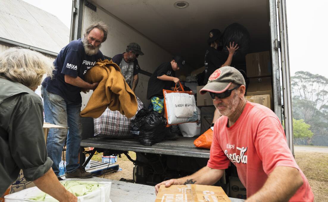 Volunteers help out at the Cobargo relief centre. Picture: Dion Georgopoulos