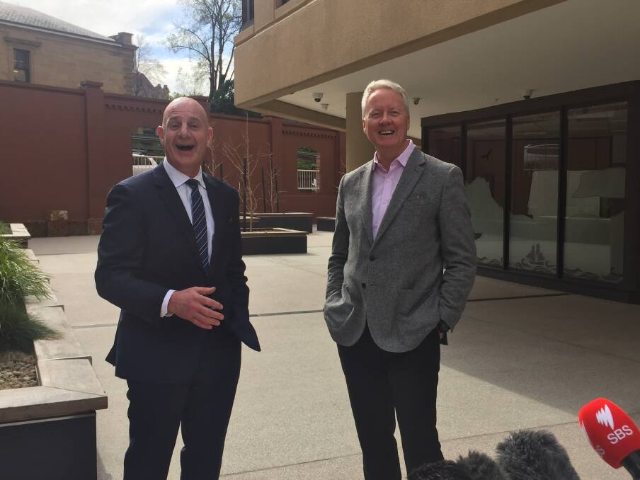 BEYOND EXPECTATIONS: Premier Peter Gutwein and Tourism Tasmania chief executive John Fitzgerald were pretty happy with the response to the Make Yourself At Home Travel Vouchers program. Picture: Emily Jarvie