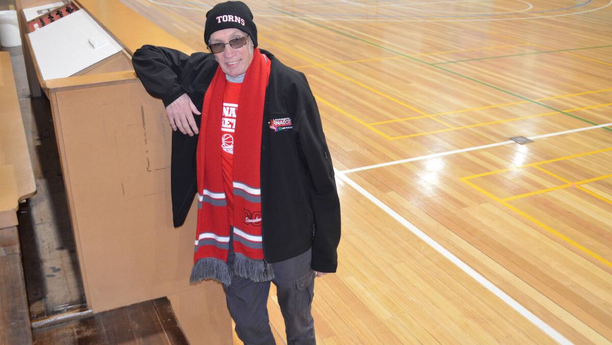 RED ALL OVER: Launceston Tornadoes volunteer Alan Stacey is heading to Melbourne to watch the team in Saturday's SEABL grand final. Picture: Sean Slatter