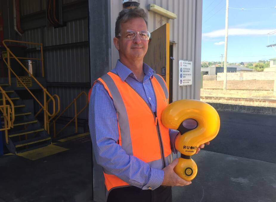 ANSWER ASSISTANCE: TasRail chief executive Damien White with Quentin the question mark. Quentin will spend three days in Tasmania. Picture: Sean Slatter