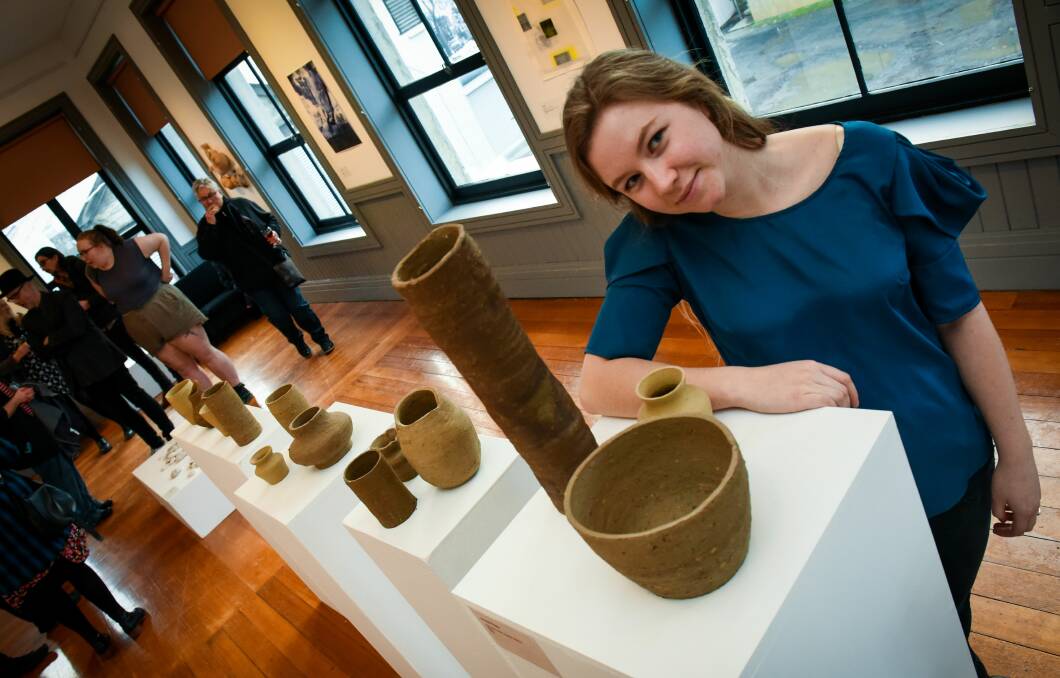 CLAY CREATIONS: Georgie Fahey, of Dilston, with some of her clay artwork at the Powerhouse Gallery at Inveresk. Picture: Paul Scambler