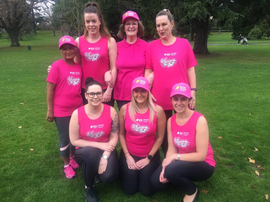 READY TO STROLL: Breast cancer survivor Tania Luttrell (top right) with some of the other Women's 5k walk/run participants.