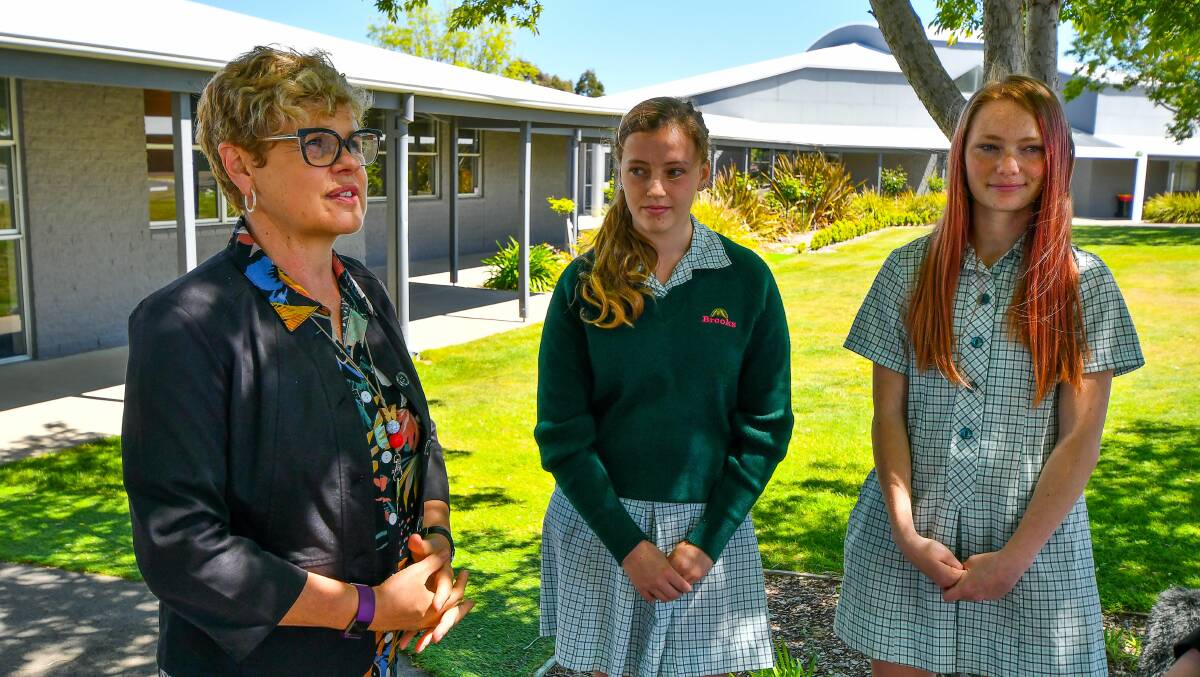 NATIONAL RECOGNITION: Brooks High School principal Louise Fisher and year nine students Azra Clark and Angel Baylis. Picture: Scott Gelston