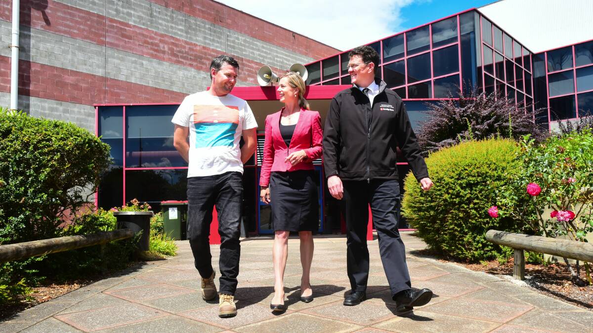 WALKING TALL: Opposition Leader Rebecca White at Deloraine Community Centre with Doug Tangney (left) and Darren Rumble (right). Picture Neil Richardson