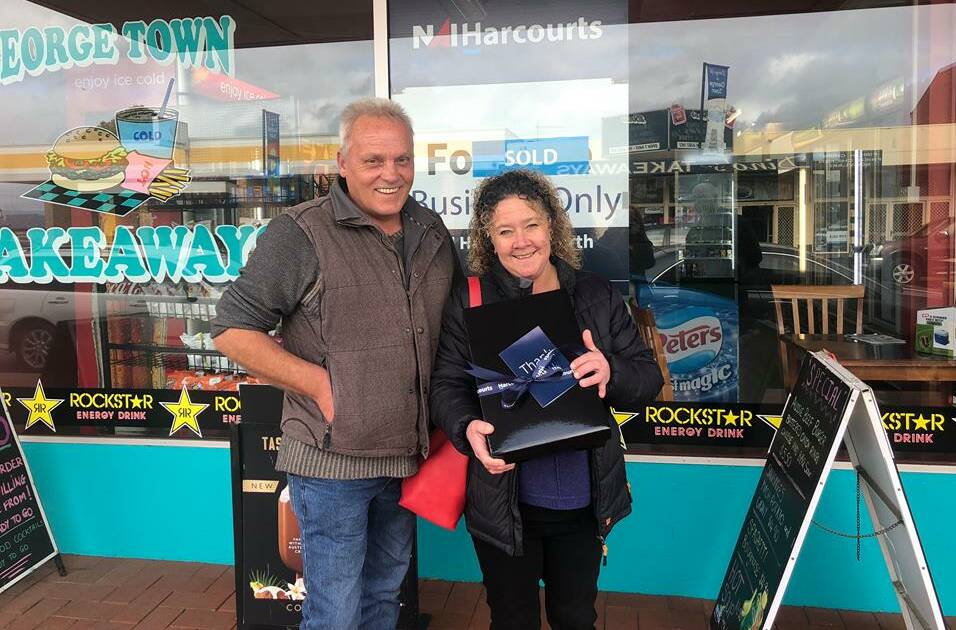 END OF AN ERA: Mark Schreuder and Georgina Howe outside George Town Takeaway. Picture: Supplied