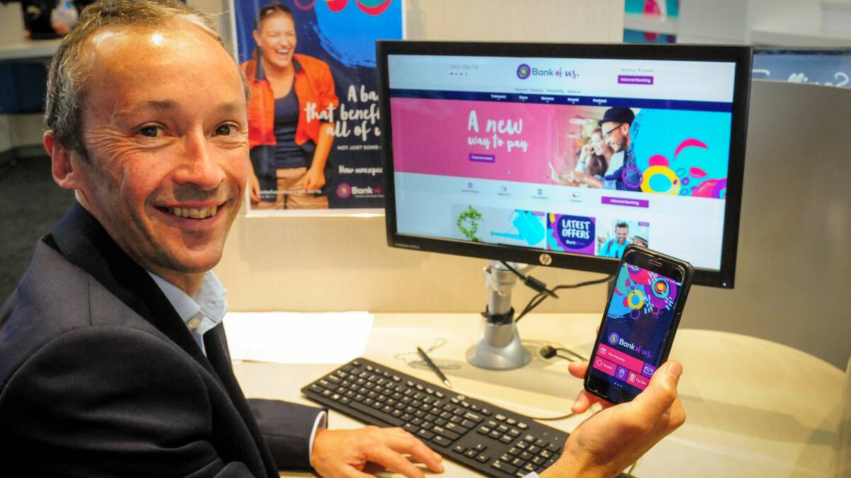 PAYMENT PROGRESS: Bank of us chief executive Paul Ranson demonstrating how to use the new payment platform launched on Tuesday. Picture: Paul Scambler