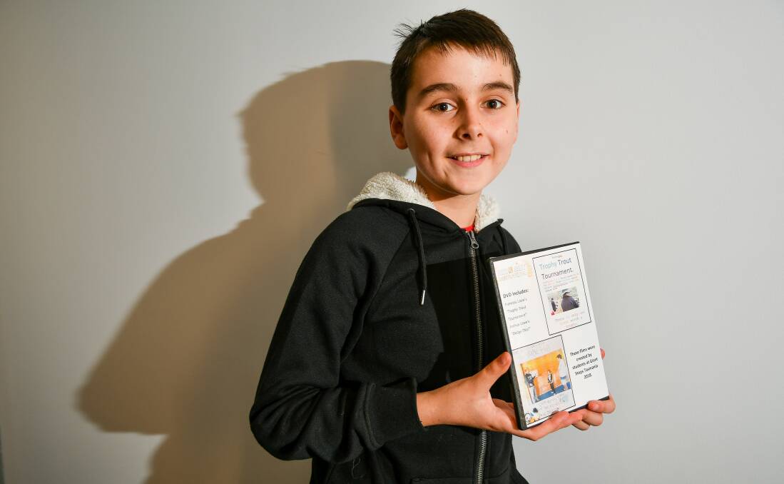 DIRECTORIAL DEBUT: Launceston filmmaker Josh Lowe with a DVD containing his work, Dodge This, and fellow Giant Steps participant Frankie's film, Trophy Trout Tounament. Picture: Scott Gelston