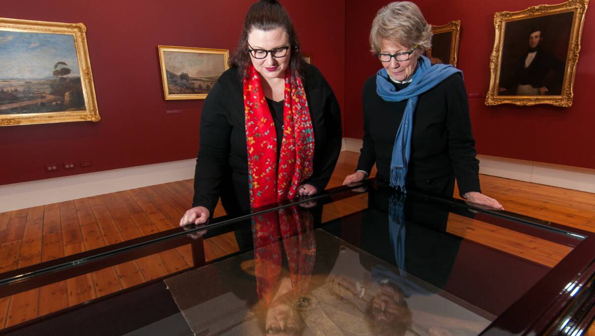 QVMAG senior conservator Amy Bartlett with curator Yvonne Adkins.