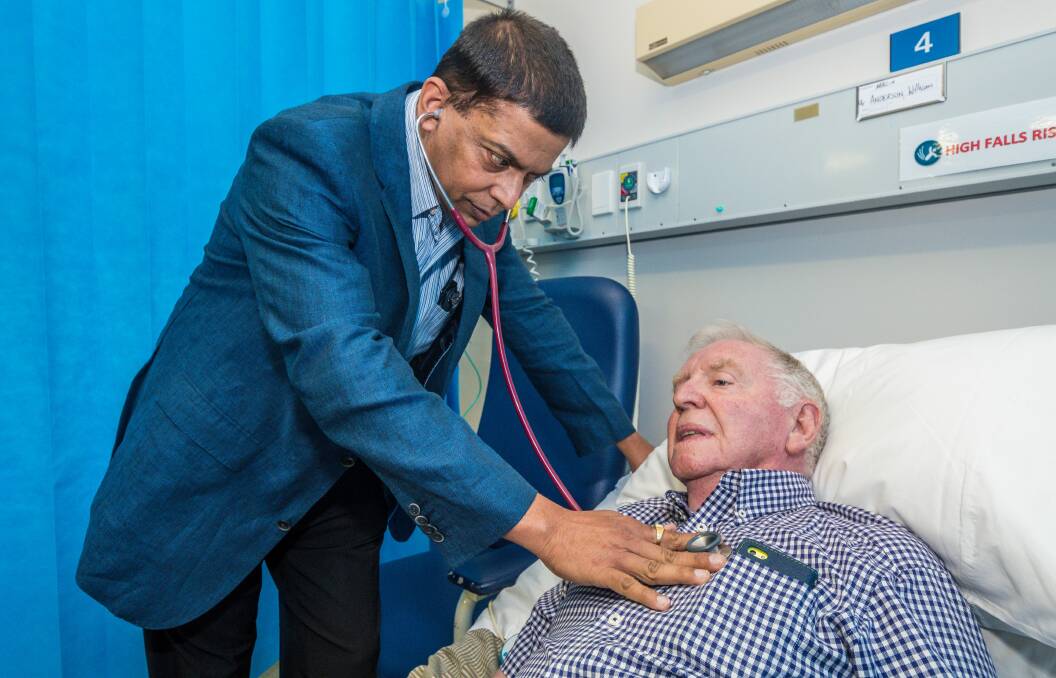 Stroke specialist Dr Dinesh Tryambake with 83-year-old William Anderson. 