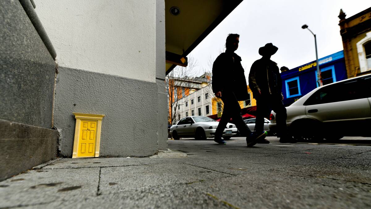 The tiny door at the Commonwealth bank on Brisbane Street. Picture: Scott Gelston 