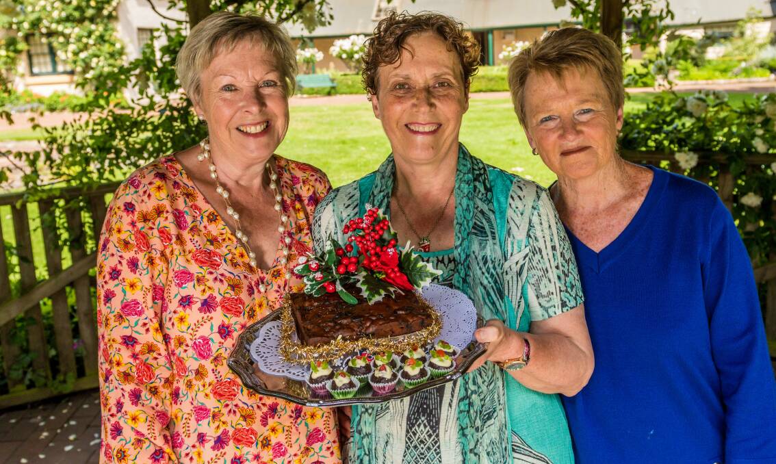 GOOD CAUSE: Franklin House Carols and Cake volunteers Margot Marthick, Julie Dineen and Bev Hogan, ahead of Sunday's event. Picture: Phillip Biggs	