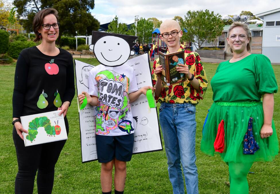 Norwood Primary School literacy support teachers Grace Evorall (left) and Zoe Marshall (right), with students Will Stevenson as Tom Gates and Levi Swift as Dr Karl. 