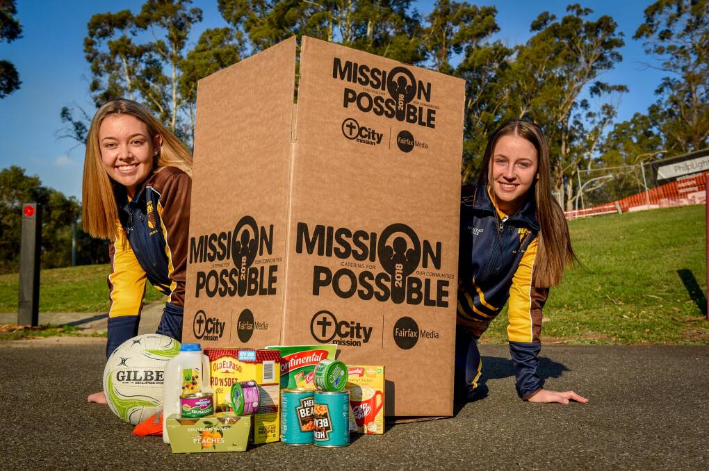 EXCITED: Northern Hawks under-19 netball players Olivia Roberts and Lauren Spencer, ahead of Saturday's donation game for Mission Possible. Picture: Paul Scambler