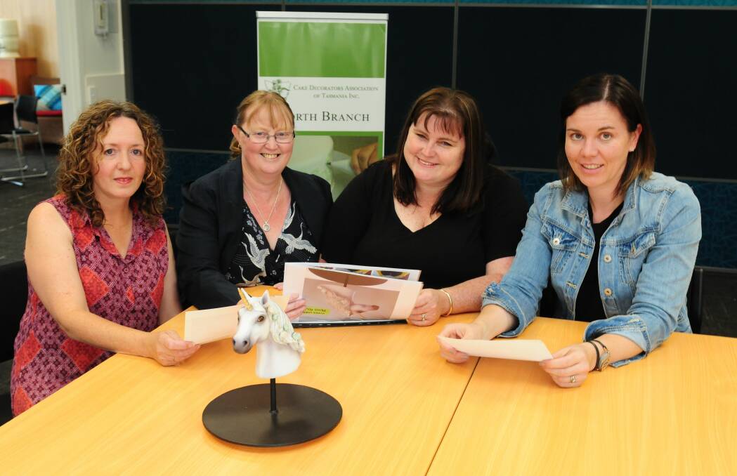 EXCITED: Cake Decorators Association of Tasmania Northern branch members Lyn Sulzberger, Jo-anne Wilson, Claudine Ball and Trisha Pickergill, with a specially decorated unicorn cake. Picture: Paul Scambler 