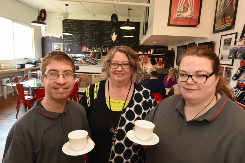 TEAM: Staff members Pavel Anichkin and Stephanie Bailey with Cafe Next Door owner Vanessa Mitchell. Picture: Paul Scambler