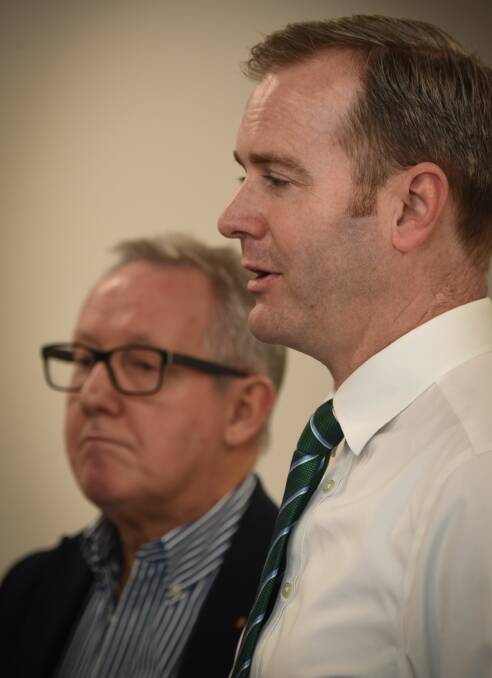 Consumer and Community Engagement Council Northern chairman Peter O' Sullivan, with Health Minister Michael Ferguson at Wednesday's funding announcement. Picture: Paul Scambler 