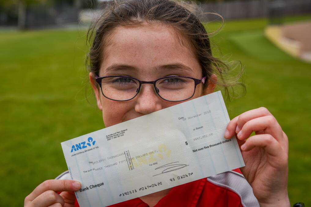 GOOD EFFORT: Sacred Heart student Lily Smith has raised $3052 for Epilepsy Tasmania, in honour of her mother. Picture: Paul Scambler 