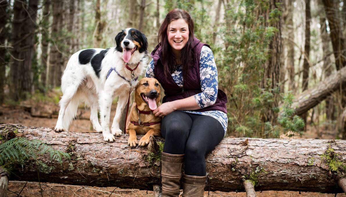 Photographer Rebecca Kostka, pictured with her dogs Chuck and Libby. 