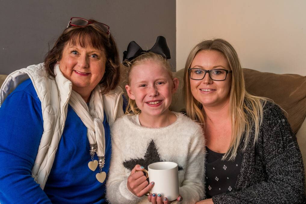 HIGH TEA: Cystic Fibrosis Tasmania vice president Judi McGee with 10-year-old Amarli Allan and Tameka Allan. Picture: Phillip Biggs 
