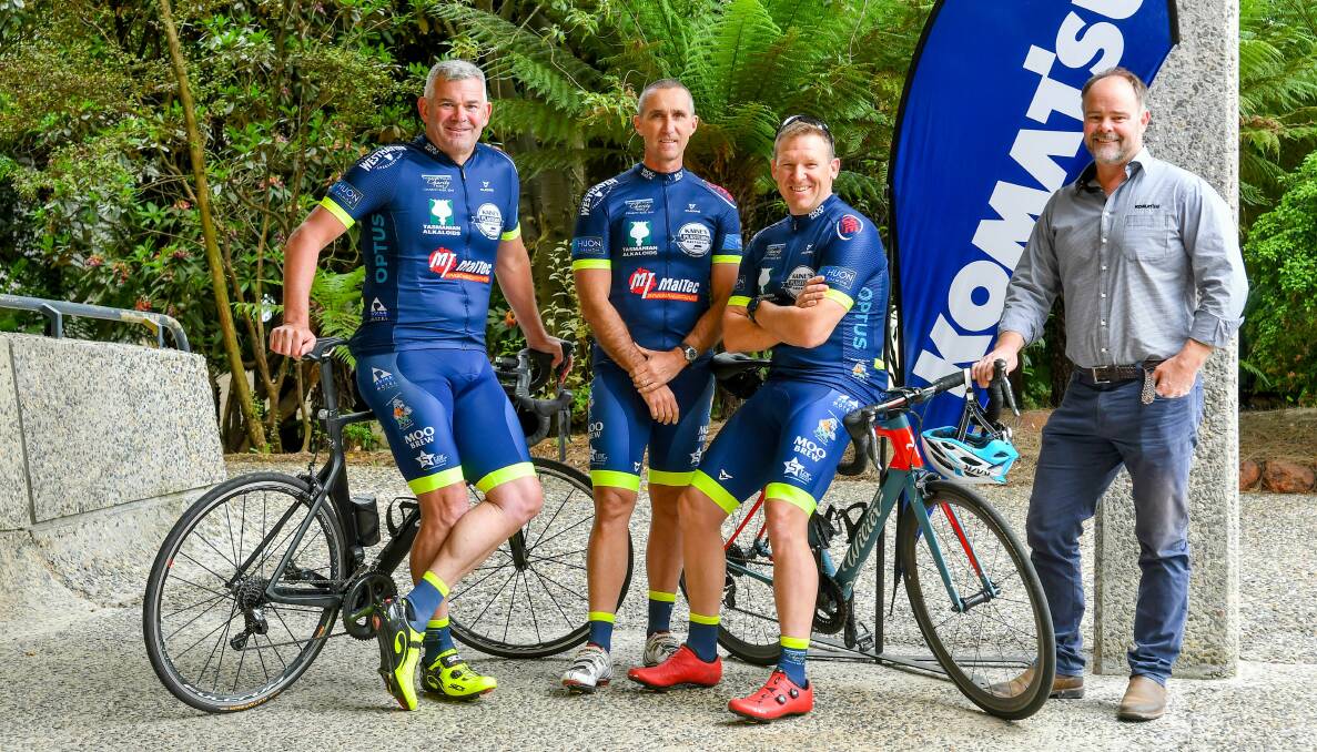 RIDE: Tasmania Police's Tony Roughan, Nick Clark and Jason Jones with sponsor Jason Cowling, of Komatsu ahead of the Charity Trust Bike Ride. Picture: Scott Gelston