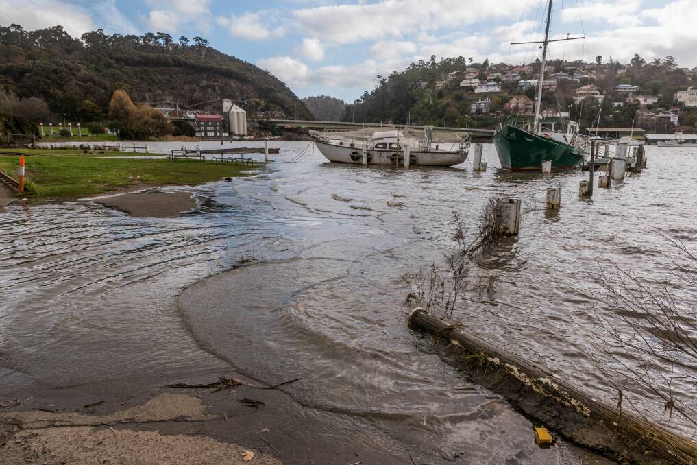 A king tide swamps the car park at the Tamar Yacht Club pontoon in Park Street. Picture: Paul Scambler 