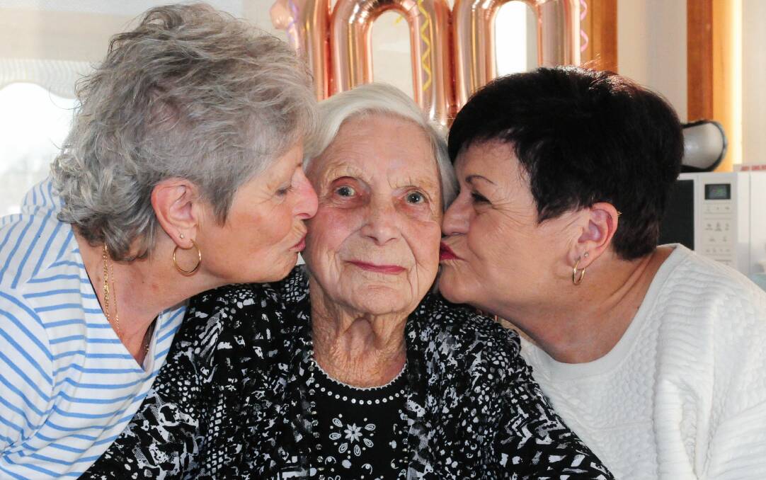 LOVED: Gwendoline Pollard, who turns 100 on July 12, with daughters Cheryl Martin and Carol Davey. Picture: Neil Richardson 