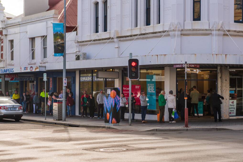 Voters at Launceston pre-poll centre on Charles Street on Thursday. Pictures: Phillip Biggs 
