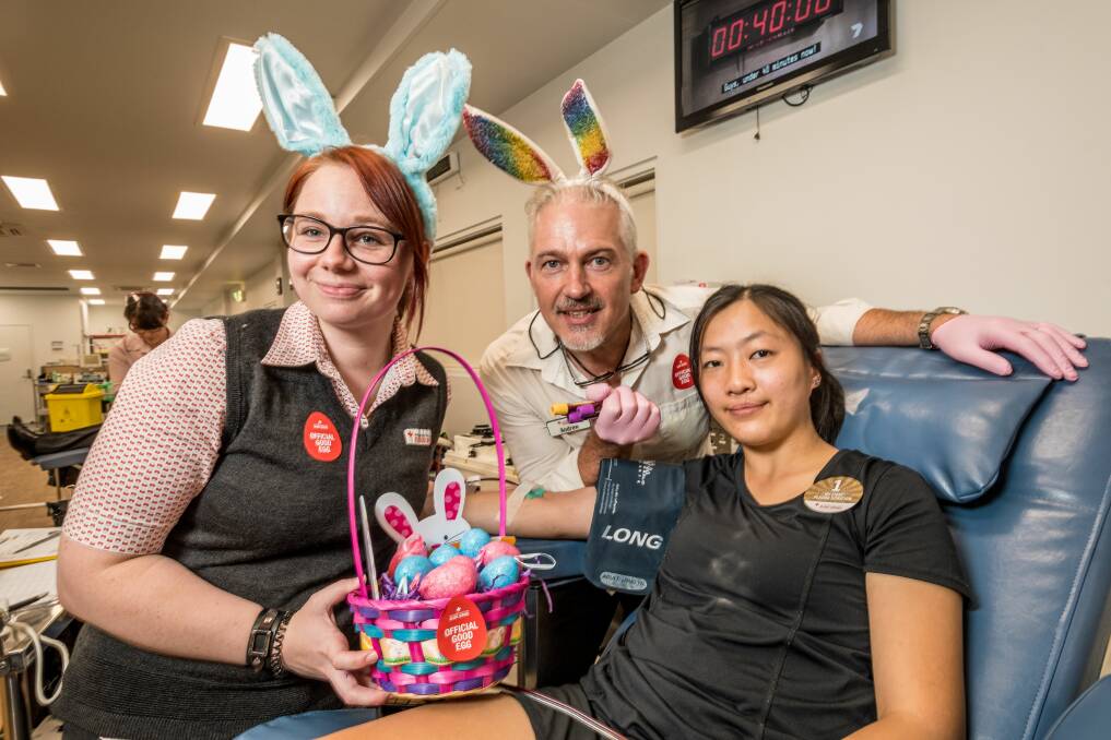 Nurse assistant Sophie Lethborg and registered nurse Andrew Mallett, with 'good egg' Jasmine Langham, who donated plasma on Wednesday. Picture: Phillip Biggs 