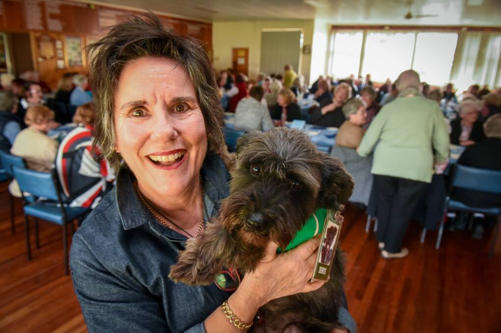 TEAM: Pastoral care worker Maryann Keach, with Doris the therapy dog at Wednesday's Winter Warmers luncheon. Picture: Paul Scambler 