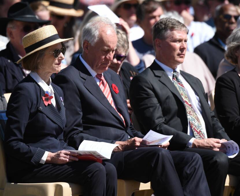 CENTRE: Professor Kate Warner and husband Richard at a commemoration service for the 100th anniversary of Armistice at Longford last year.