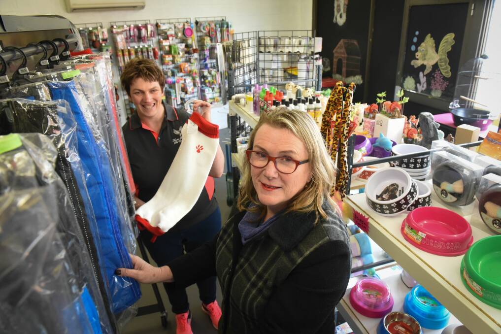 Shop assistant Mel Triffett and Oak Tasmania Launceston team leader Eleanor Kramer. Picture: Paul Scambler. 