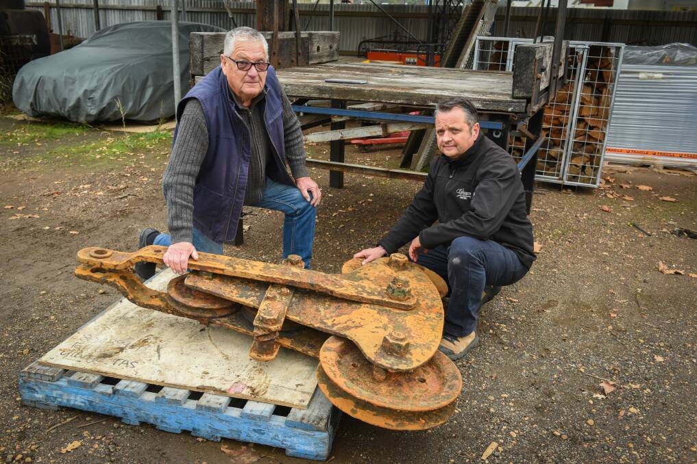 Glasgow Engineering's John Hutton and Duck Reach Historical Society's Shane Deddington with the retrieved carriage. Picture: Paul Scambler 