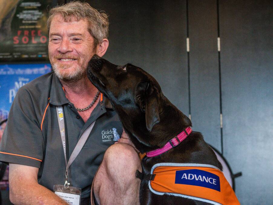 Paul Wyld and Paris help educate people about the role guide dogs play in assisting people who are blind or vision impaired. 