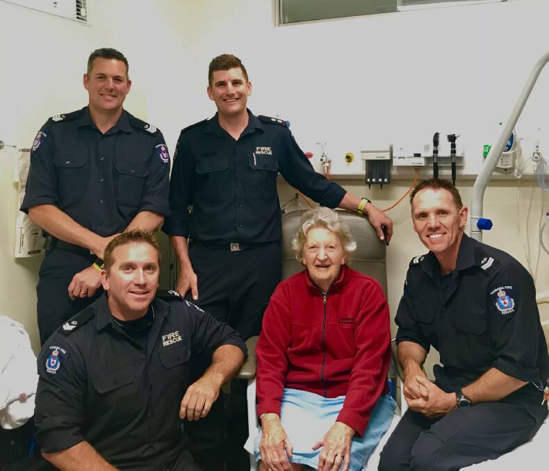 HEROES: Eunice Sprague pictured with Launceston firefighters (back) Charlie Watson, acting Station Officer Adrian Adams and (front) Jason Buchanan and Jason Luck. Picture: Supplied