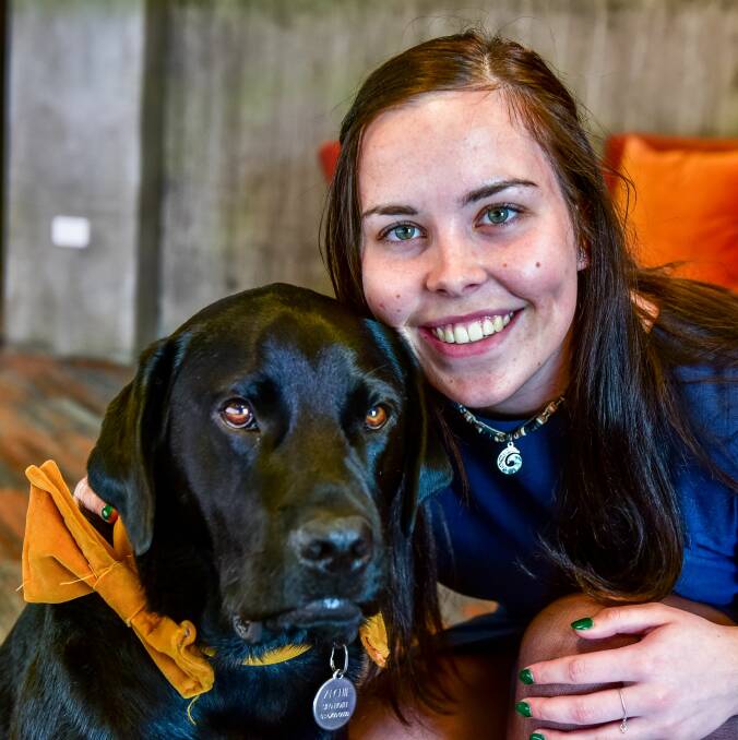 Peppers Silo Hotel receptionist Bianca Ridler with best friend and work mate Archie the Silo Dog. 