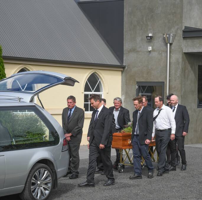 MISSED: Pallbearers carrying the casket of Tony Long, at Monday's service at the Franklin Grove Centre. Pictures: Paul Scambler 