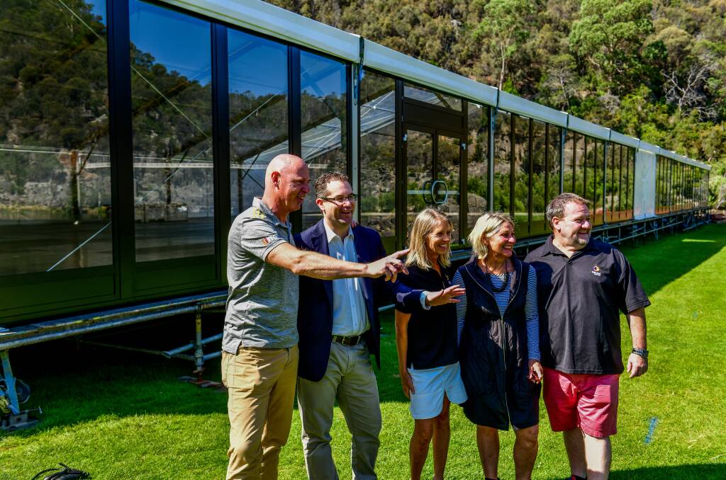EXCITED: Hawthorn Football Club's David Cox, Peppers Silo Hotel's Paul Seaman, Flinders Island's Liz Frankham, Festivale's Bronwin Ballantyne and David Dunn at the Gorge on Sunday. Picture: Scott Gelston