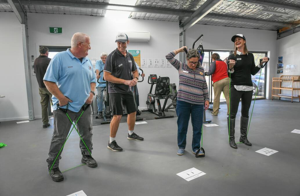 Rocherlea Shed member Richard Bowerman, Northern Suburbs Community Centre general manager Denise Delphin and Healthy Tasmania's Lucy Byrne, test out some of the new equipment. Picture: Paul Scambler 