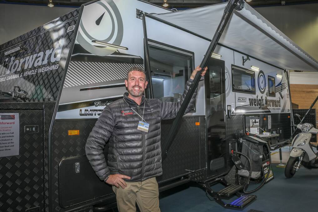 Cameron Harwood, of Weigh Forward, with a custom-built Condor Ultimate Family caravan. Pictures: Craig George 