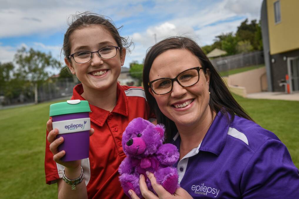 Lily Smith with Bec Wylie, of Epilepsy Tasmania. Picture: Paul Scambler 
